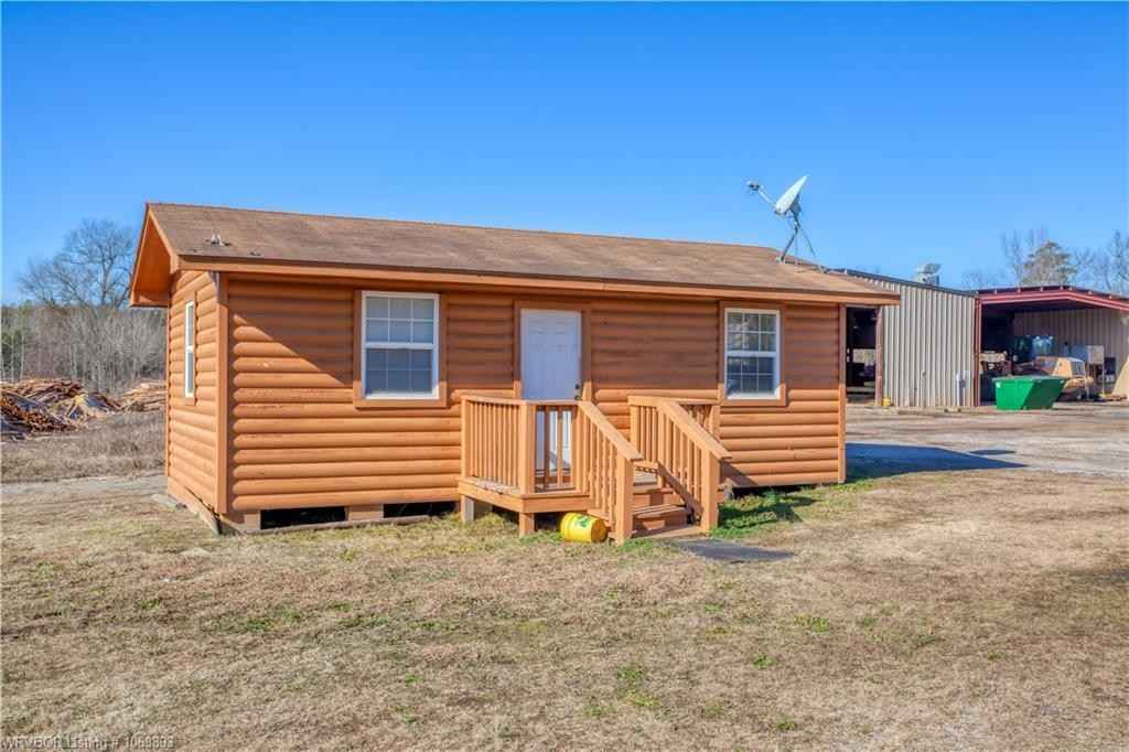 5864 N 71 HWY  