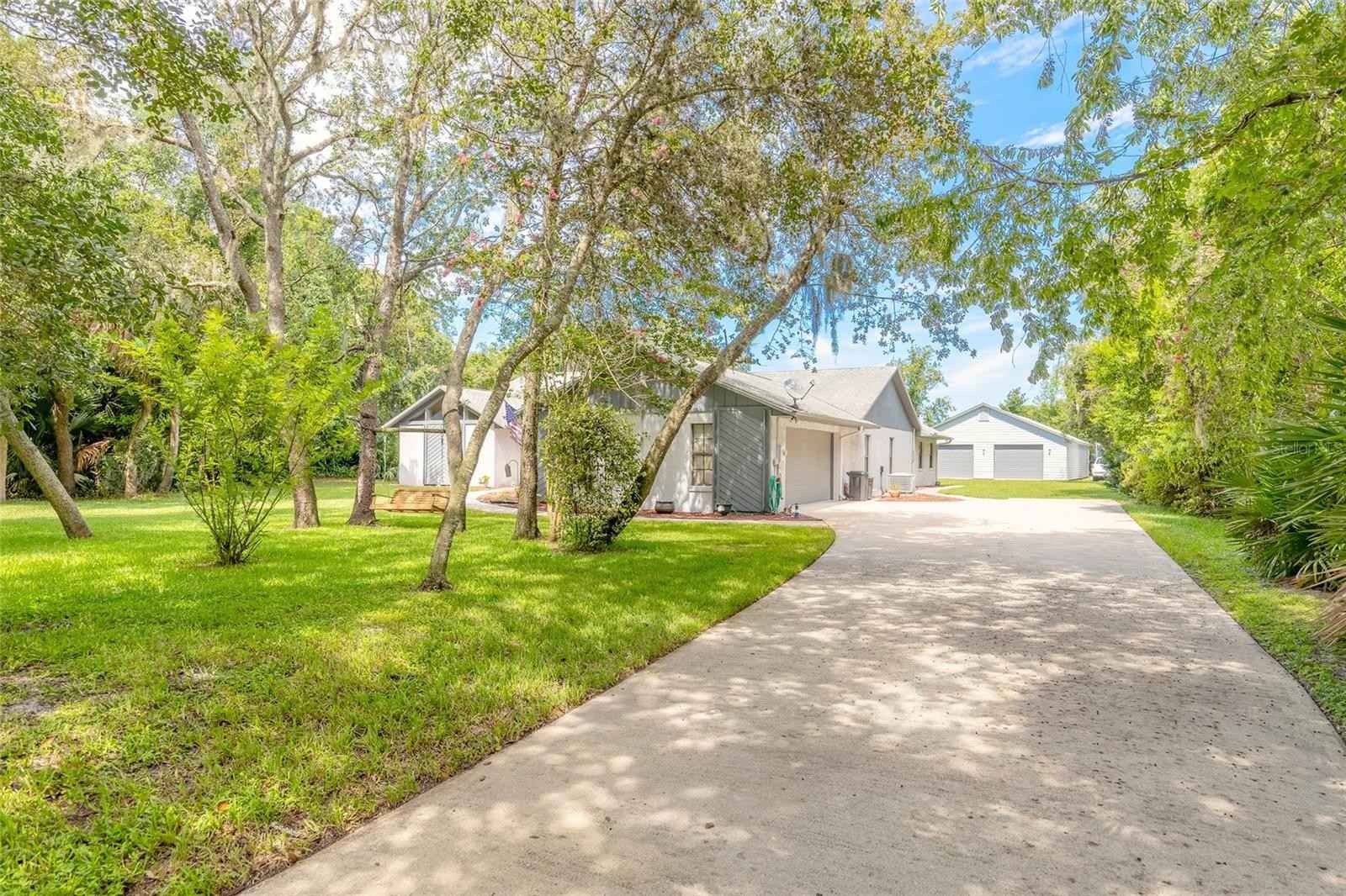 5803 Spruce Creek Woods Dr  