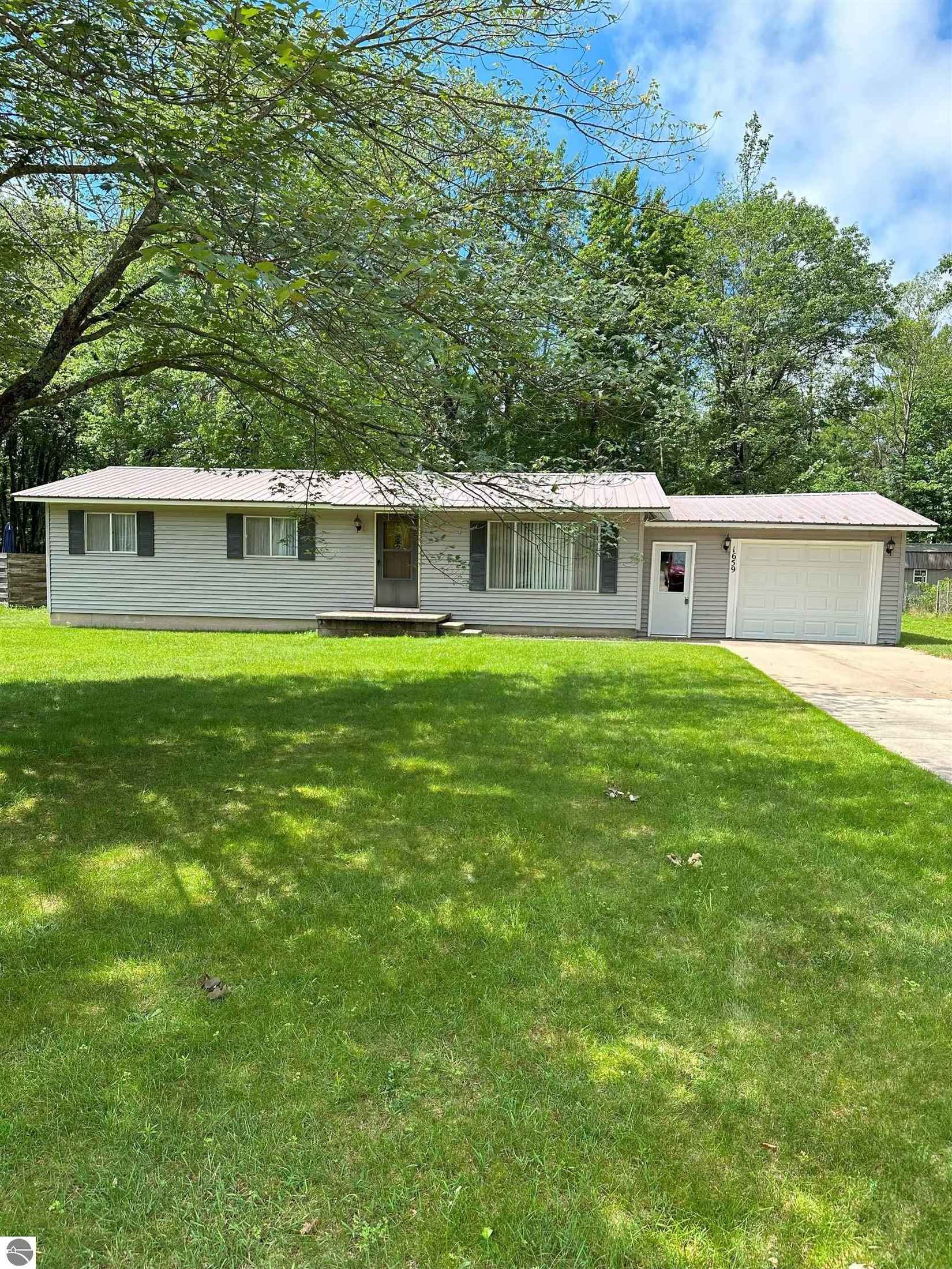 1659 NE Katinka Dr  